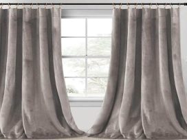 How can velvet curtains be used to control the amount of natural light in a room
